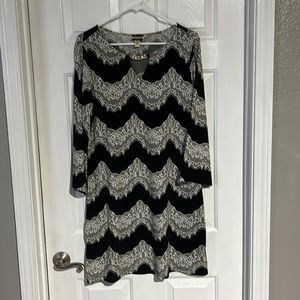 Long sleeve dress with jewels at front opening. From a smoke free home.